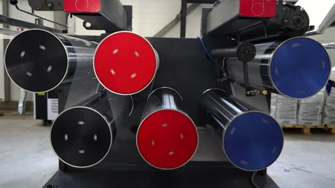 The polypropylene web passes through a system of stretching rollers. Stock Footage 141237970