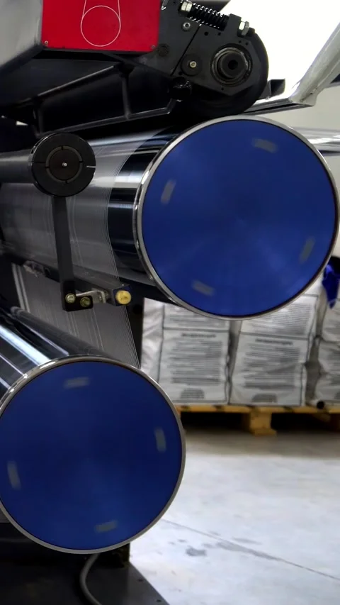 The polypropylene web passes through a system of stretching rollers. Produc.. Stock Footage 291955164