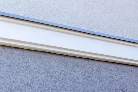 Polystyrene border closes the expansion joint on the facade, waterproofing jo Stock Photos