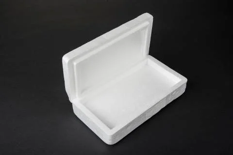 Polystyrene box on a black background for smartphone Stock Photos
