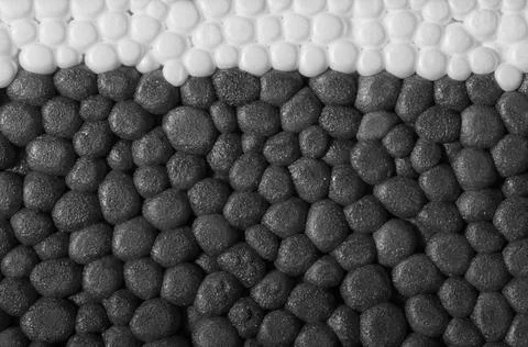 Polystyrene closeup closeup of a white and grey combination Polystyrene su... Stock Photos