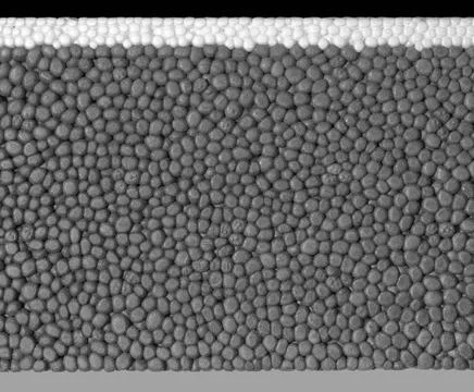 Polystyrene closeup closeup of a white and grey combination Polystyrene su... Stock Photos