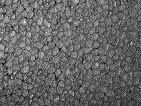 Polystyrene closeup Full frame closeup of a grey Polystyrene surface Copyr... Stock Photos