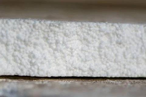 Polystyrene foam. White background. Stock Photos