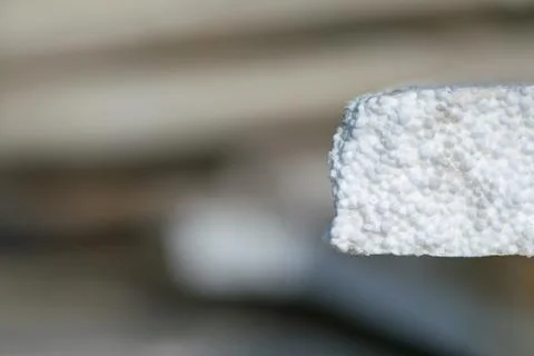 Polystyrene foam. White background. Stock Photos