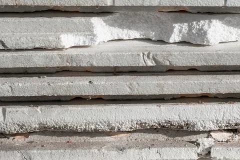 Polystyrene foam. White background. Stock Photos