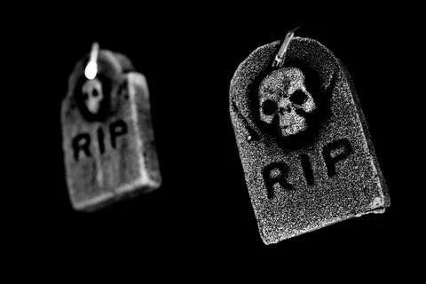 Polystyrene tombs for halloween on a black background Stock Photos