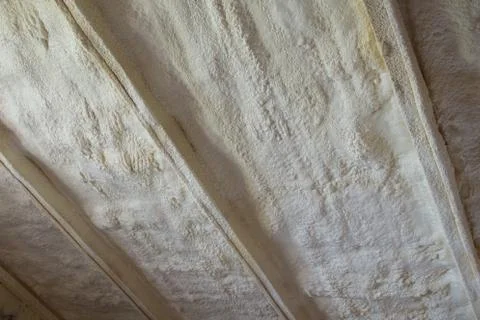 Polyurea Spraying, warming foam coating of roof. Foto stock