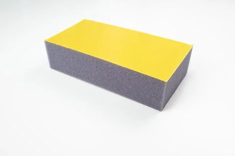 Polyurethane foam with adhesive layer Foto stock