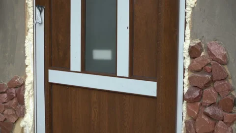 Polyurethane foam for installing new door Video stock 136899520