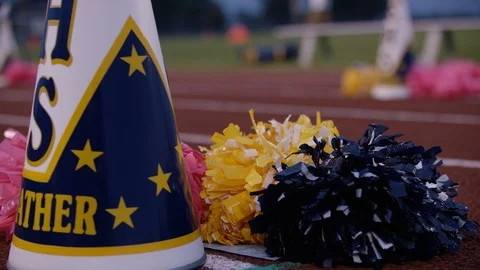 Pom poms on a running track. Video stock 102796733