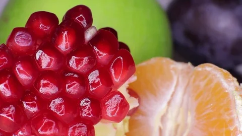 Pomegranade, mandarin and apple  Stock Footage 81213279