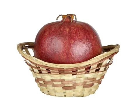 Pomegranate in the basket Stock Photos