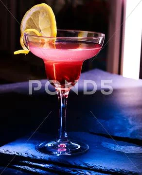 Pomegranate cocktail on black background Stock Photos