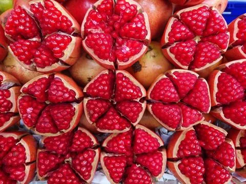 Pomegranate cut of half Stock Photos