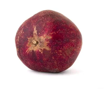 Pomegranate fruit burnt and saturated with sunlight with delicious seeds on a Stock Photos