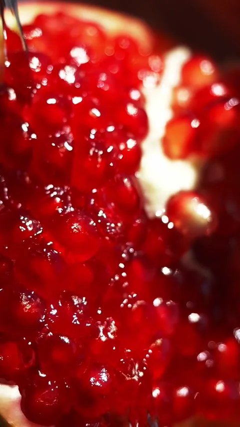 Pomegranate fruit close up vertical video. fresh harvested fruits and vegetables Stock Footage 277275576