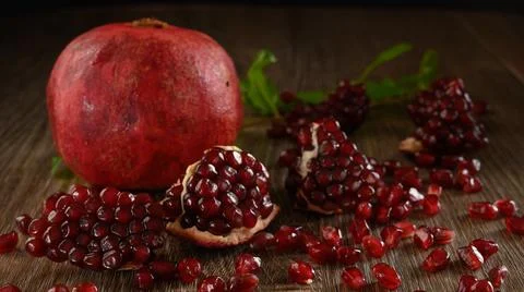 Pomegranate fruit on dark background horizontal hd Stock Photos