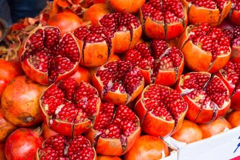 Pomegranate fruit / Ruby red, delicious and nutrient rich pomegranates pack a Foto stock