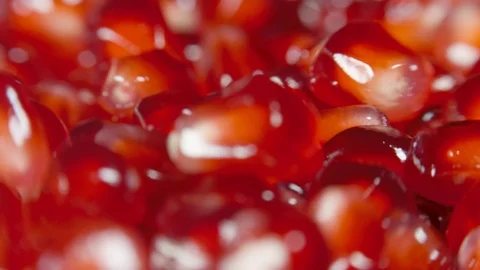 Pomegranate grains on a rotating table Stock Footage 100547228