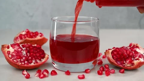 Pomegranate Juice Stockbeeldmateriaal 295990718