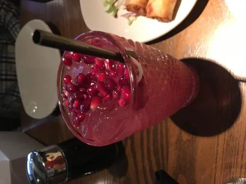 Pomegranate lime mocktail Stock Photos