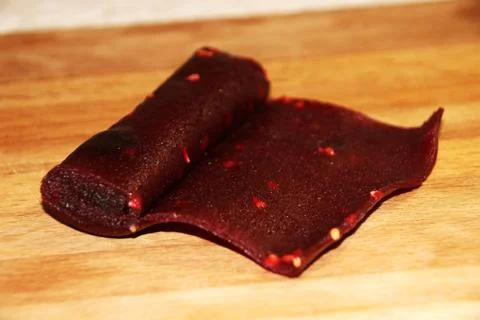 Pomegranate paste on board Stock-Fotos