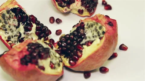 Pomegranate rotation on the table, close-up Stock Footage 60068012