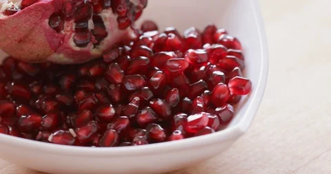 Pomegranate seed close-up Stock Footage 120608104