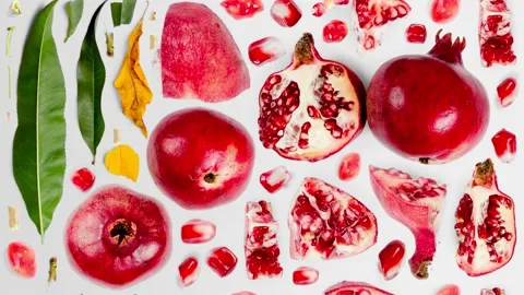 Pomegranate Slice and Leaf Collection Video stock 221405715
