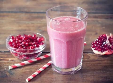 Pomegranate smoothie Stock Photos