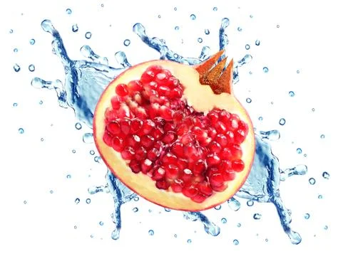 Pomegranate splash Stock Photos