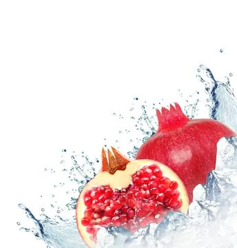 Pomegranate splash Stock Photos