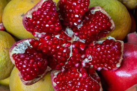 Pomegranate with split red colored grains Stock-Fotos
