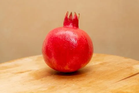 Pomegranate on the table Stock Photos