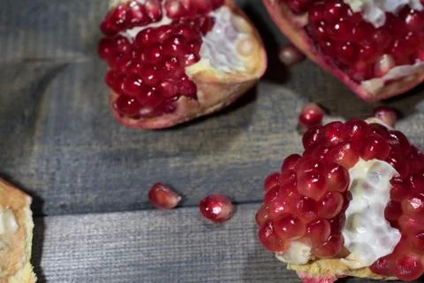 Pomegranate on a table Stock Photos