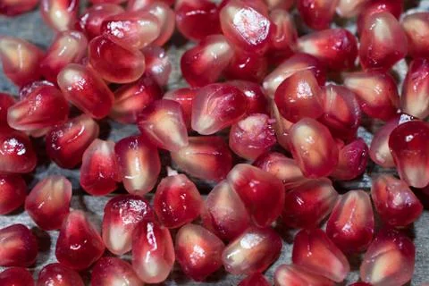 Pomegranate on a table Stock Photos