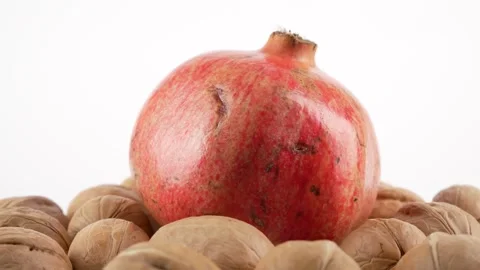 Pomegranate with Walnuts. Stock Footage 319420203