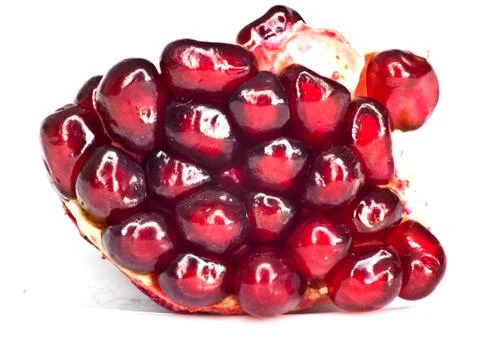 Pomegranate on a white background. macro Stock Photos