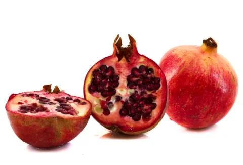 Pomegranate in a white background Stock Photos
