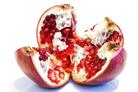 Pomegranate on a white background Stock Photos