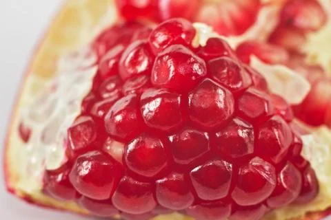 Pomegranate on a white background Stock Photos