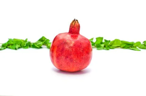 Pomegranate on white background Stock Photos