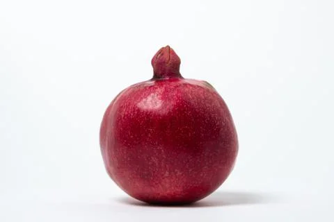 Pomegranate on a white background. Stock Photos