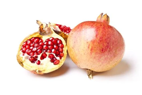 Pomegranate on white Stock Photos