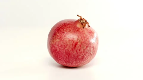 Pomegranate In White Space Stock Footage 232695428