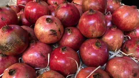 Pomegranates closeup on market table. Stock Footage 159751085