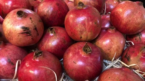 Pomegranates closeup on market table. Stock Footage 162670043