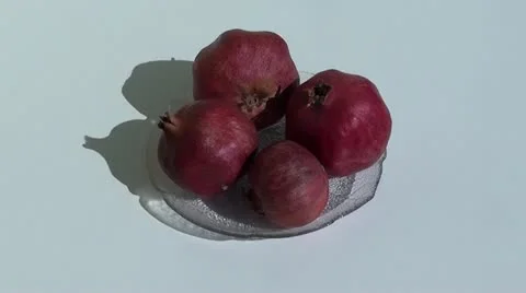 Pomegranates on plate zoom in Stock Footage 12797571