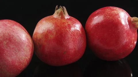 Pomegranates in a row Stock Footage 8571671
